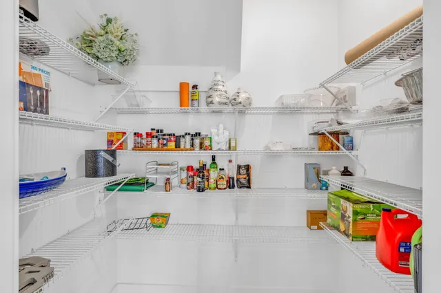a view of living room with furniture and window