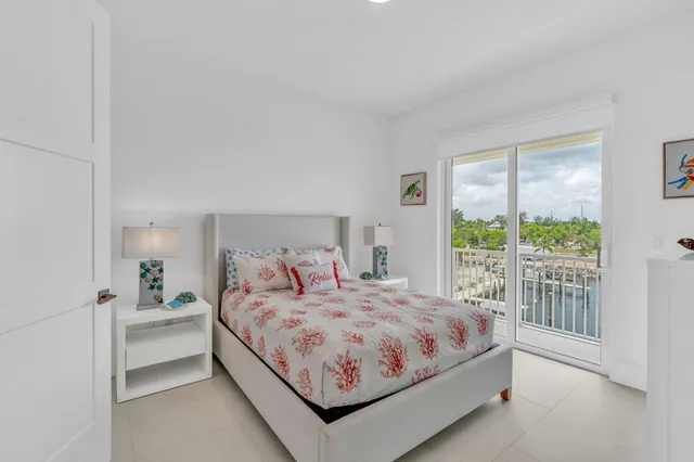 a swimming pool with outdoor seating and yard