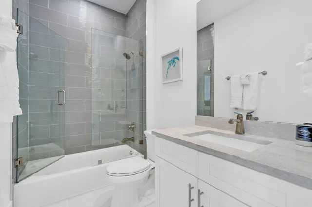 a view of a patio with a table and chairs