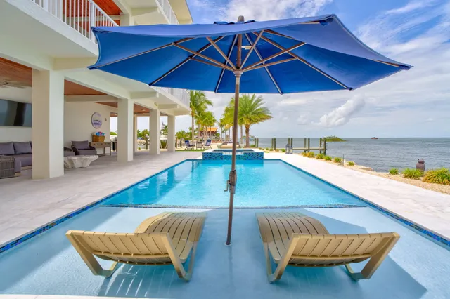 a house with a yard and a garage