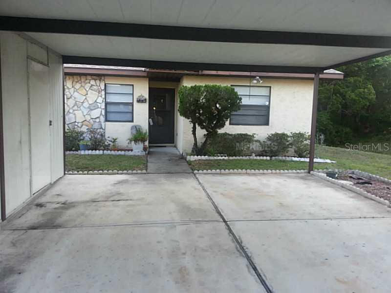 6425 Drexel Drive, Unit 8 Port Richey, FL 34668 - Photo 1 of 1 Exterior Front - 2 space carport