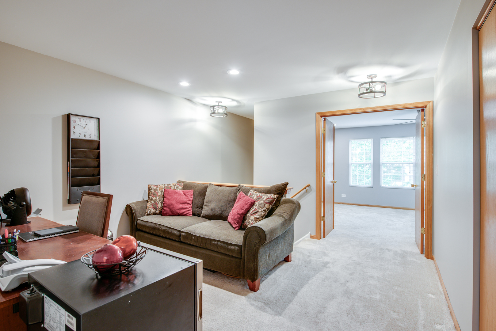 239 Springbrook Trail South Oswego, IL 60543 - Photo 11 of 20 a living room with furniture and a window