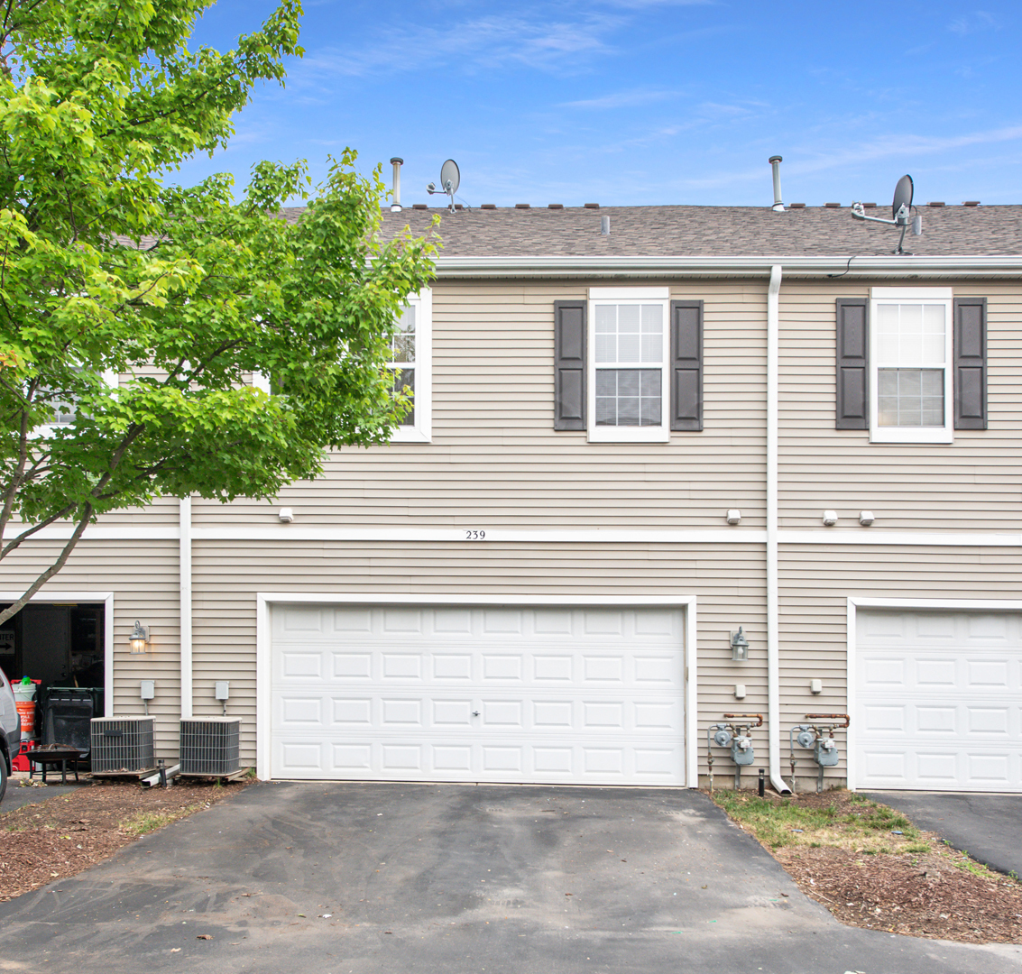 239 Springbrook Trail South Oswego, IL 60543 - Photo 20 of 20 a front view of a house