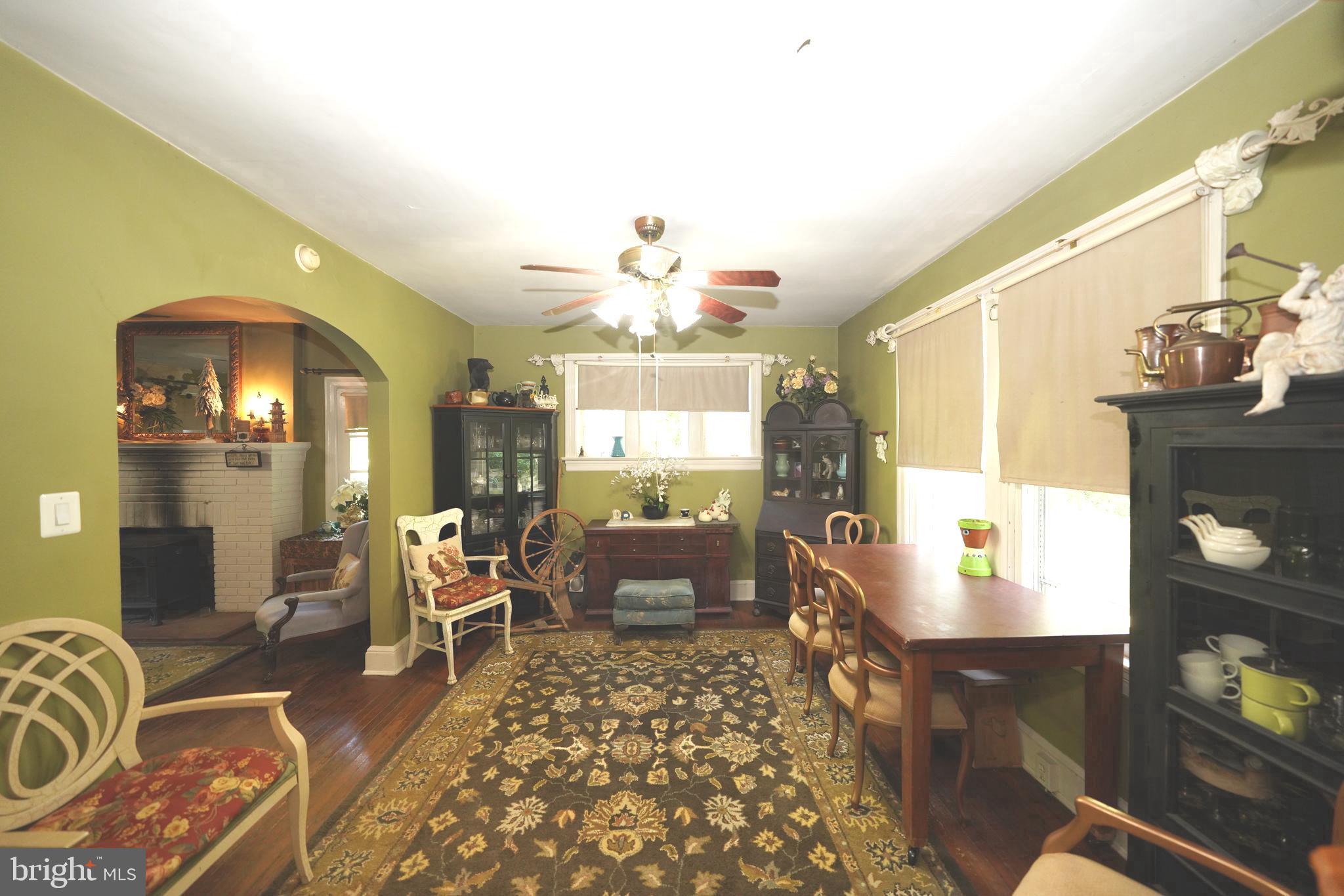 Greenbelt Road Lanham, MD 20706 - Photo 46 of 74 a living room with furniture and a chandelier