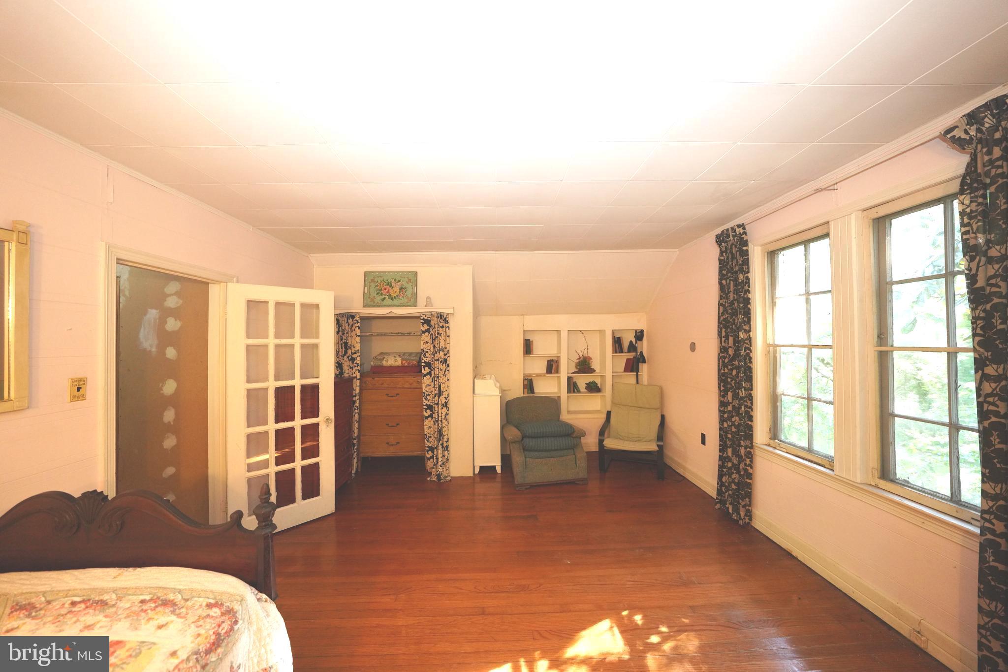 Greenbelt Road Lanham, MD 20706 - Photo 66 of 74 a view of a bedroom with furniture and staircase