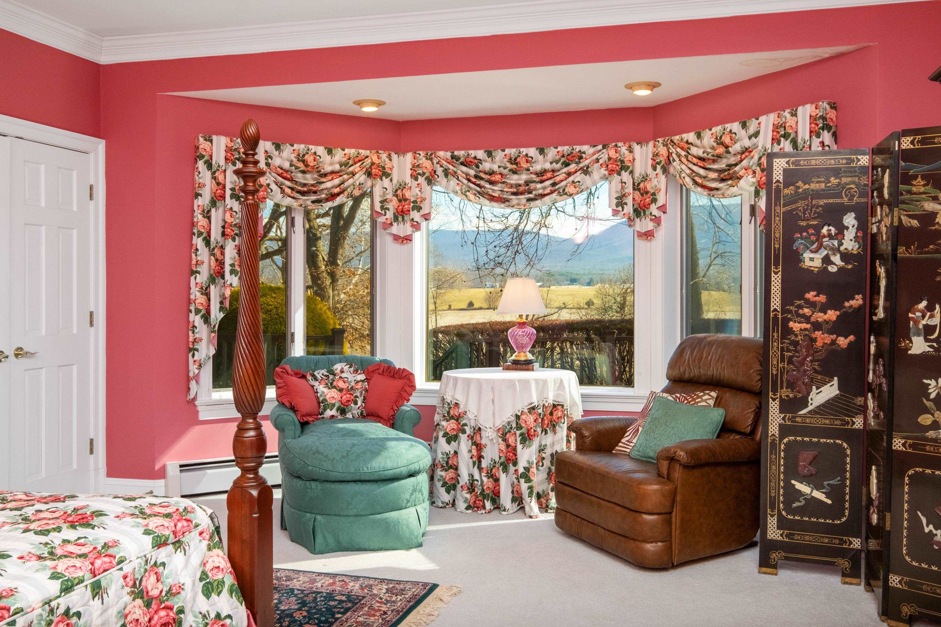 1219 Rockfish Road Waynesboro, VA 22980 - Photo 46 of 75 a living room with furniture and a floor to ceiling window