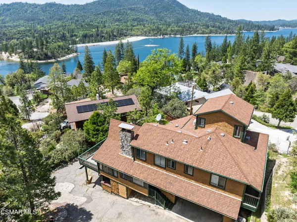 an aerial view of a house with a garden