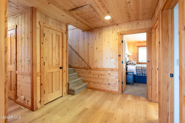 a view of a bathroom with a tub and shower