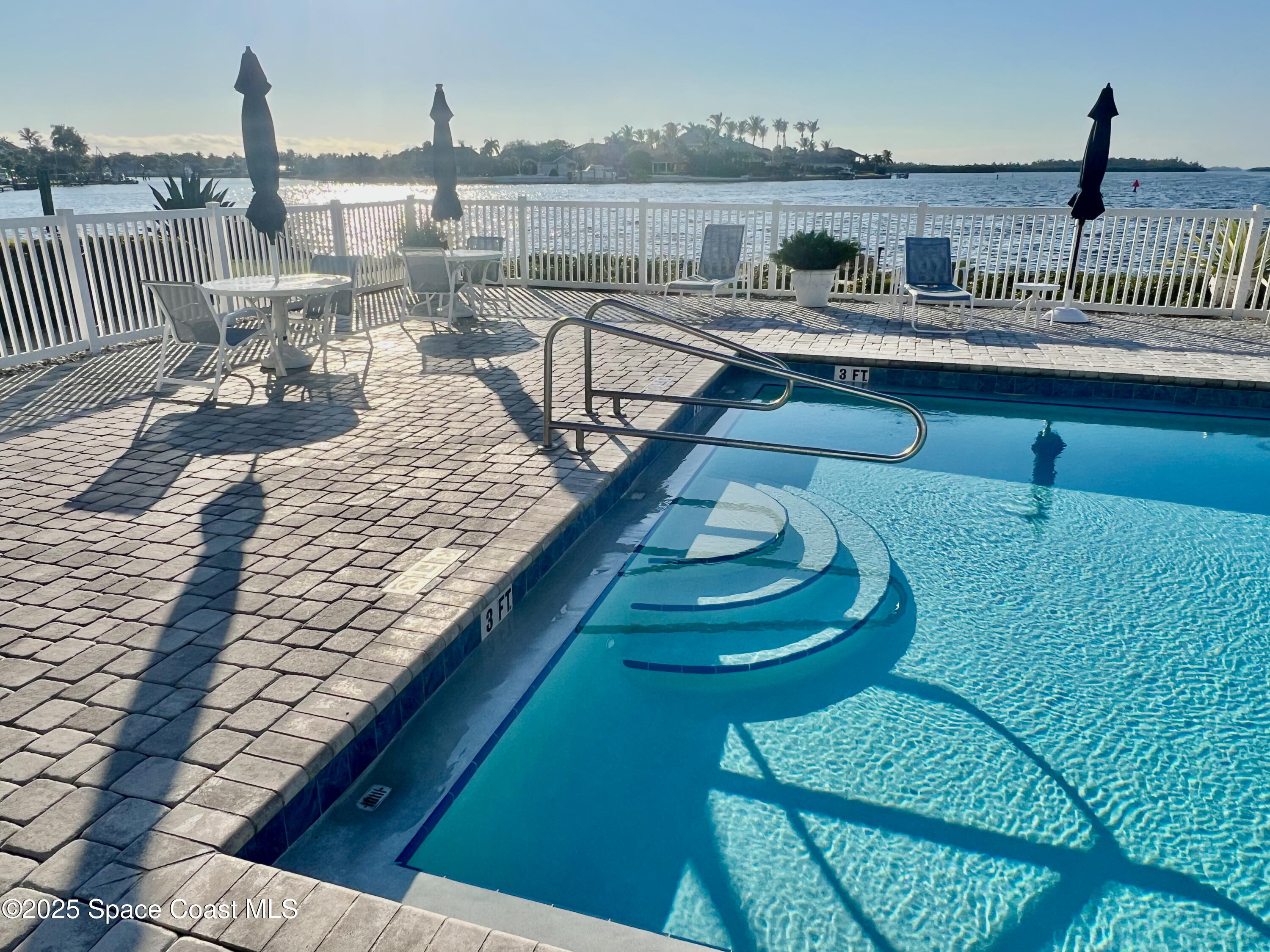 1903 Bay Road, Unit 205 Vero Beach, FL 32963 - Photo 40 of 53 1903 Bay ext dm pool steps