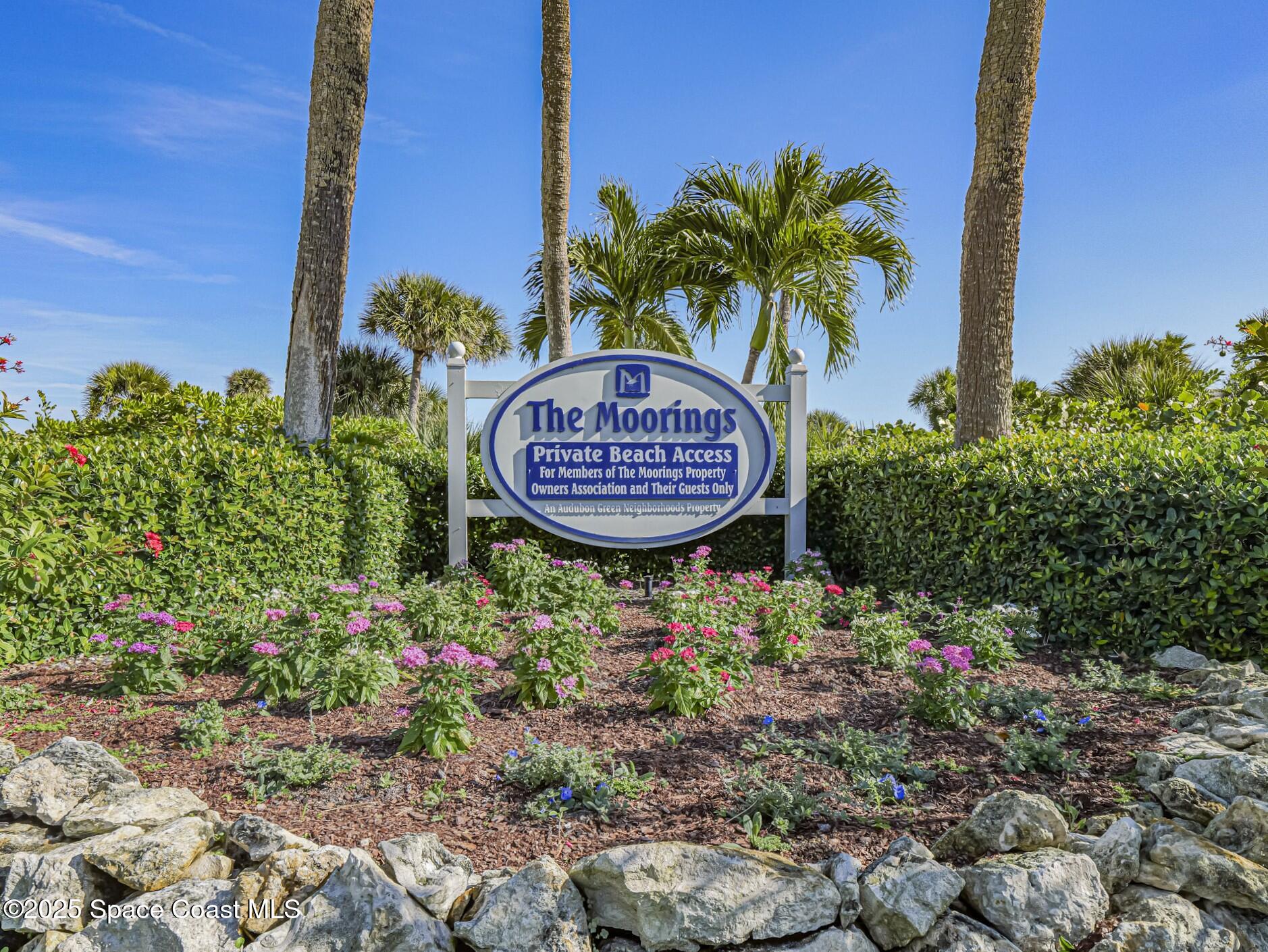 1903 Bay Road, Unit 205 Vero Beach, FL 32963 - Photo 44 of 53 a sign on the side of the road