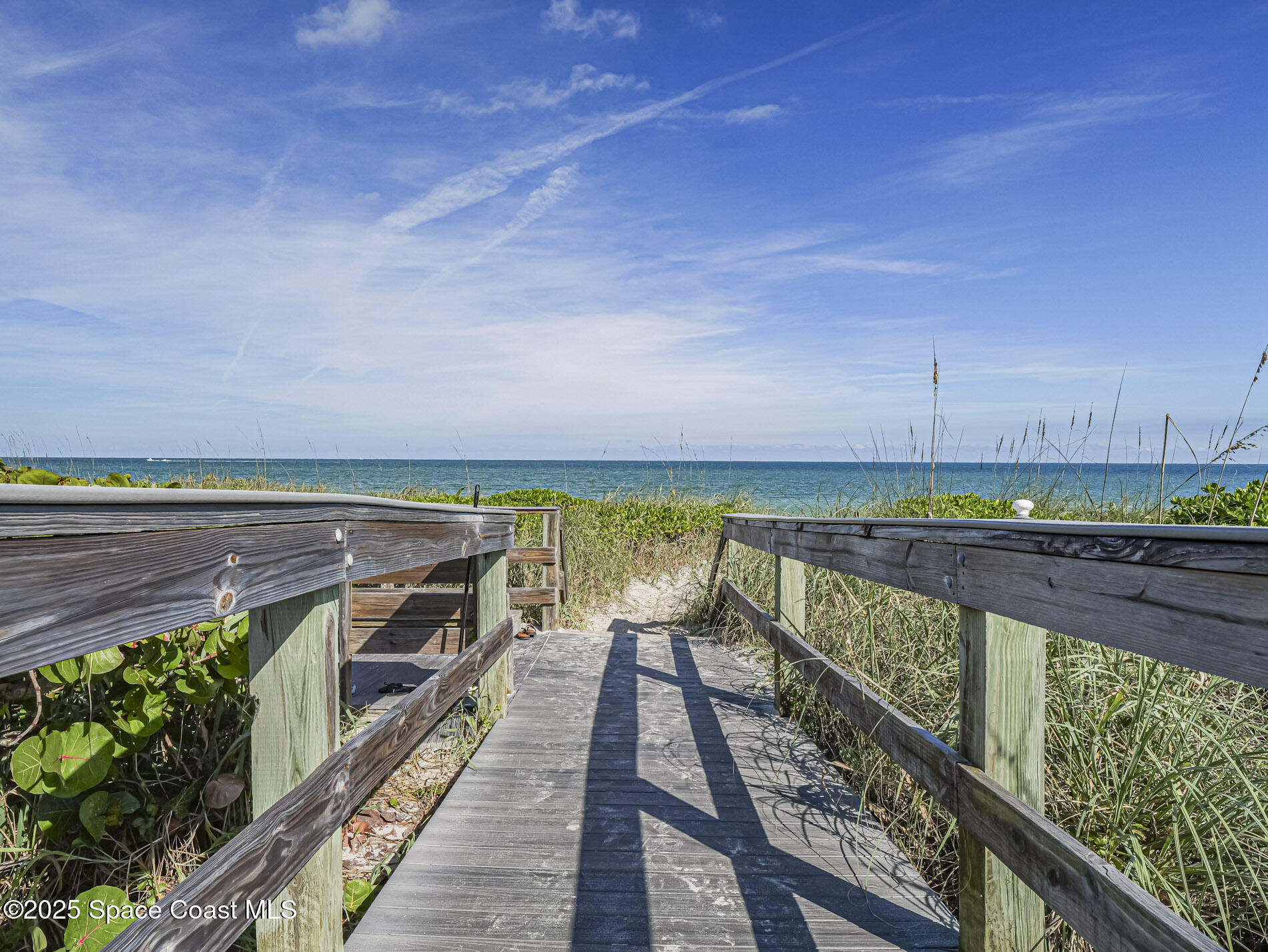 1903 Bay Road, Unit 205 Vero Beach, FL 32963 - Photo 46 of 53 a view of a balcony with wooden floor and outdoor space