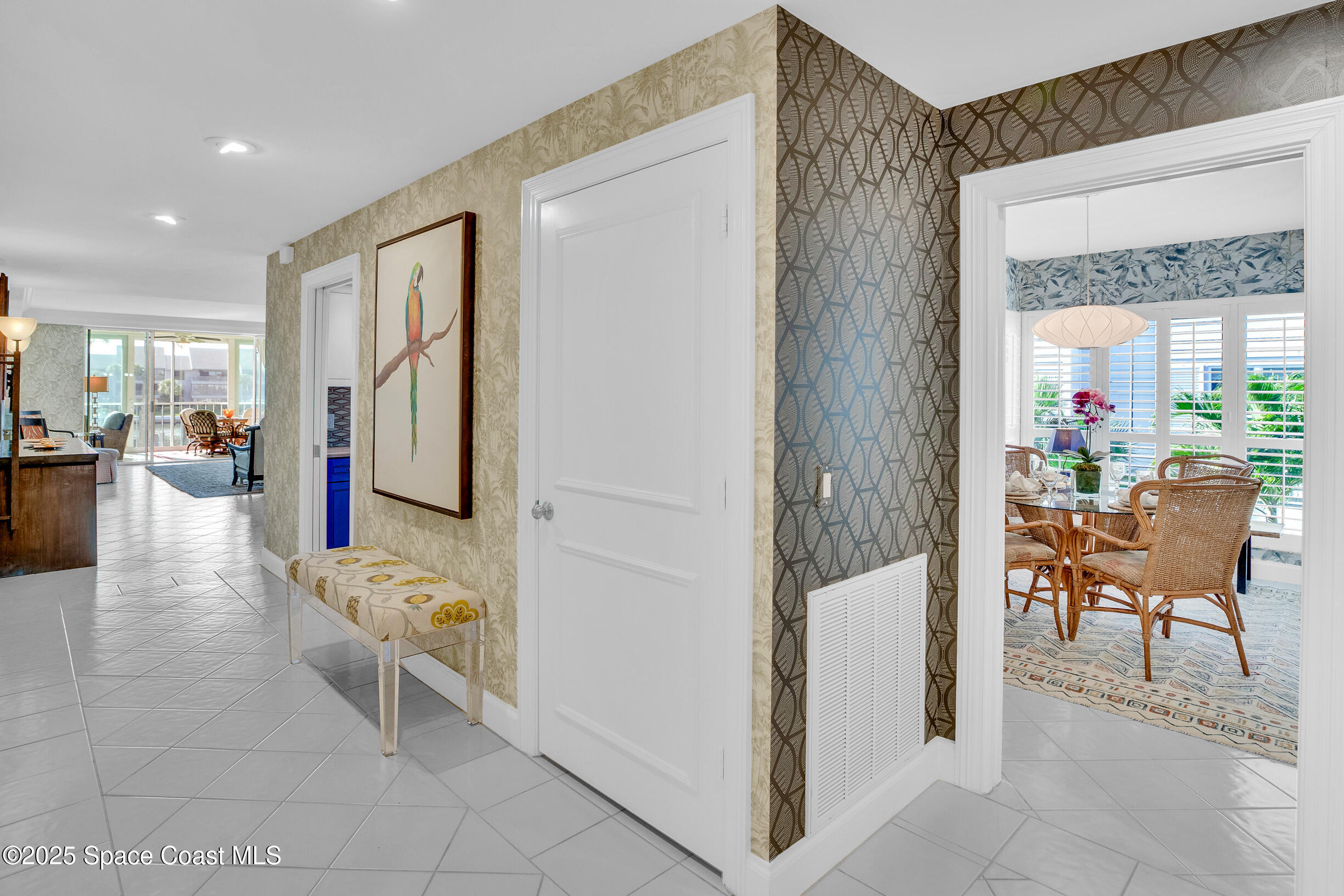 1903 Bay Road, Unit 205 Vero Beach, FL 32963 - Photo 6 of 53 a living room with furniture and a large window