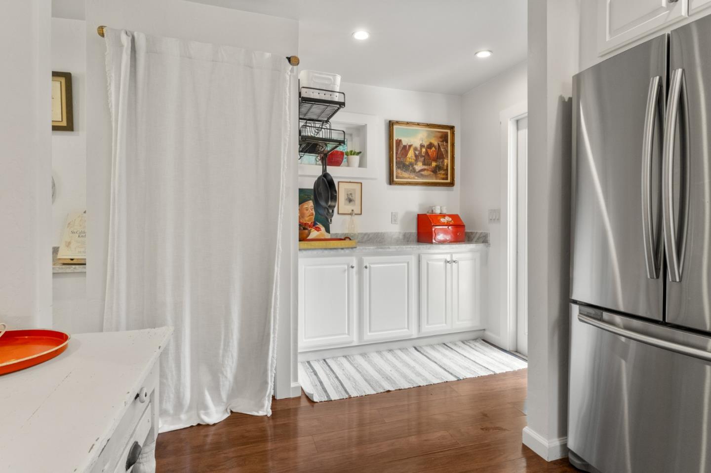 140 Baker Road Aptos, CA 95003 - Photo 14 of 62 a kitchen with stainless steel appliances granite countertop a refrigerator and a sink