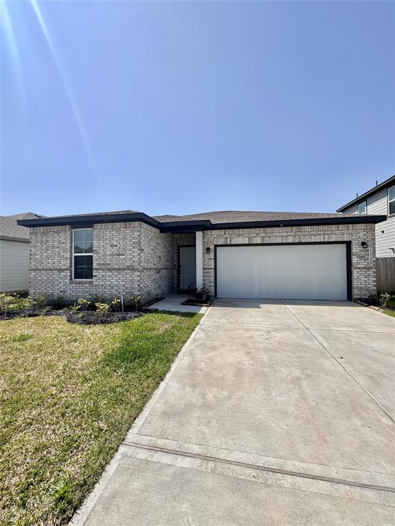 14108 Lost Ml Road Conroe, TX 77303 - Photo 1 of 20 front view of a house with a yard