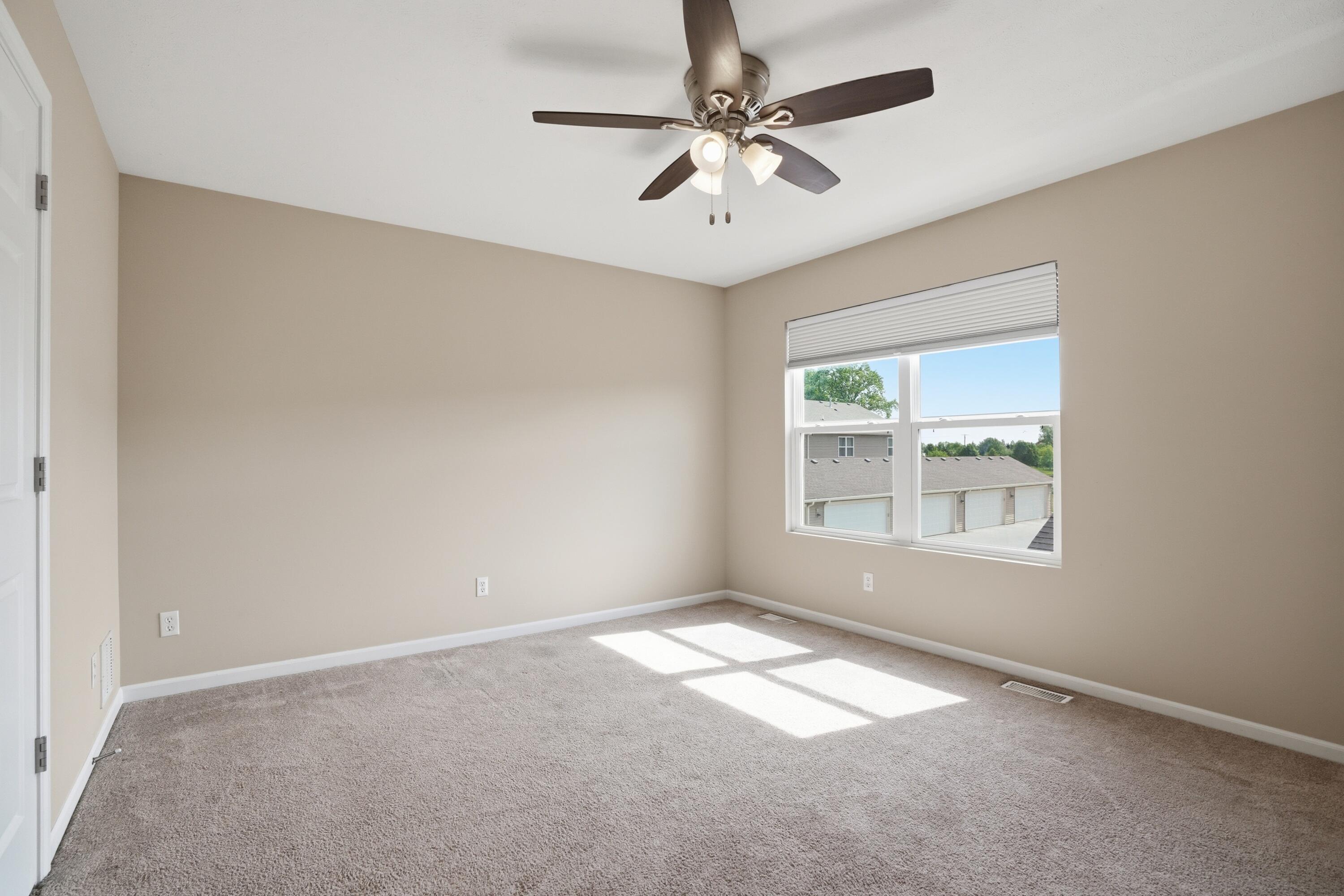 11351 Rhode Island Street Crown Point, IN 46307 - Photo 8 of 18 an empty room with a window
