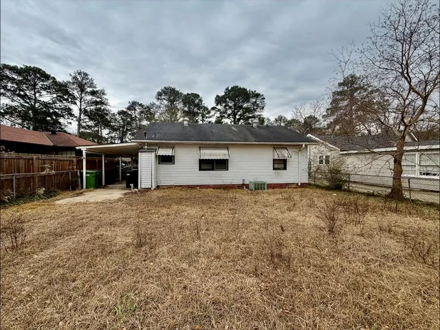 front view of a house with a trees