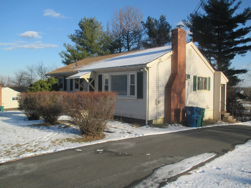 12 Locke Road Billerica, MA 01821 - Photo 2 of 16 a view of a house with a yard