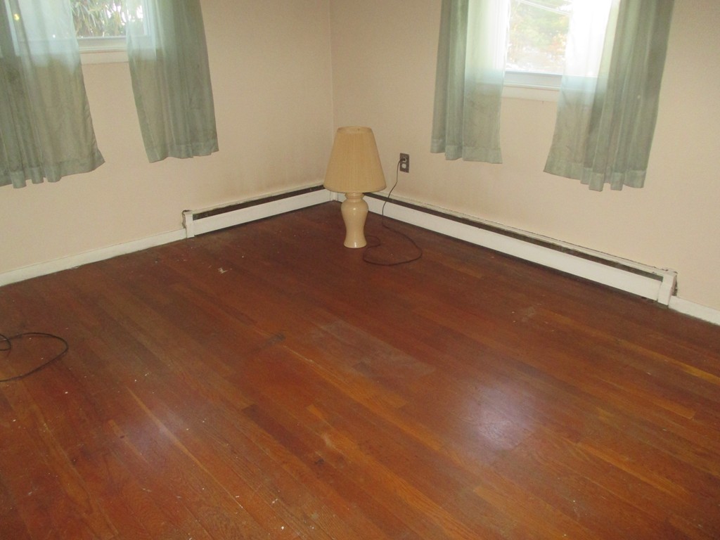 12 Locke Road Billerica, MA 01821 - Photo 7 of 16 a view of empty room with window