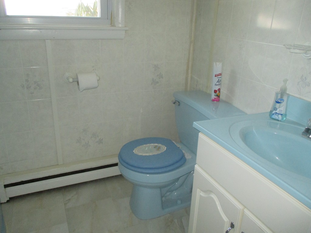 12 Locke Road Billerica, MA 01821 - Photo 8 of 16 a bathroom with a sink and a toilet
