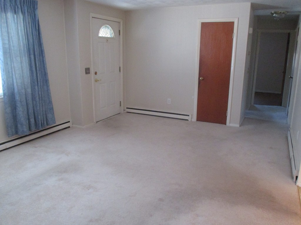 12 Locke Road Billerica, MA 01821 - Photo 9 of 16 a view of an empty room and closet area