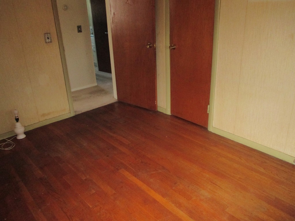 12 Locke Road Billerica, MA 01821 - Photo 10 of 16 an empty room with wooden floor