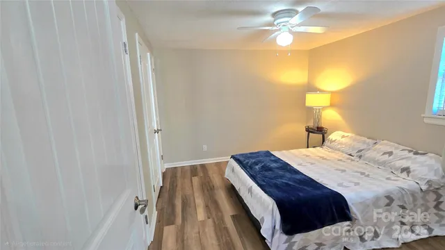 a room with gym equipment and view of living room