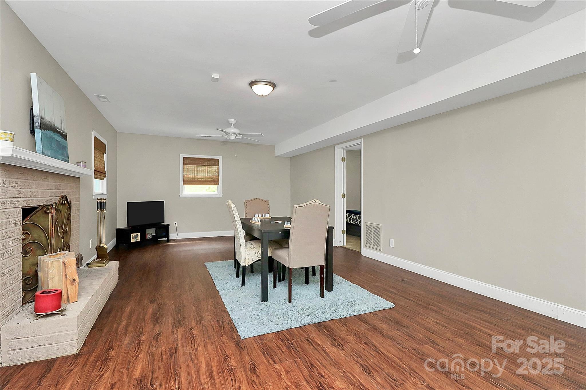 6500 Old Providence Road Charlotte, NC 28226 - Photo 26 of 40 a view of a livingroom with furniture and a fireplace