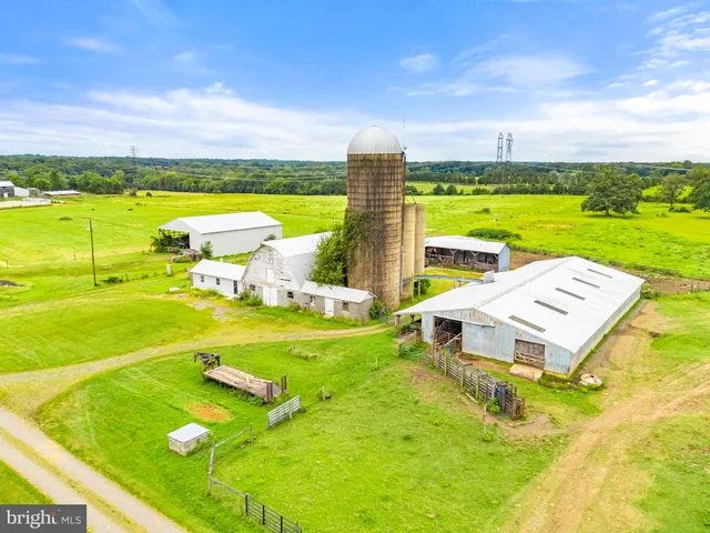a view of a lake with a houses in the background