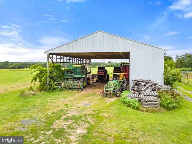 a view of a lake with houses in the background
