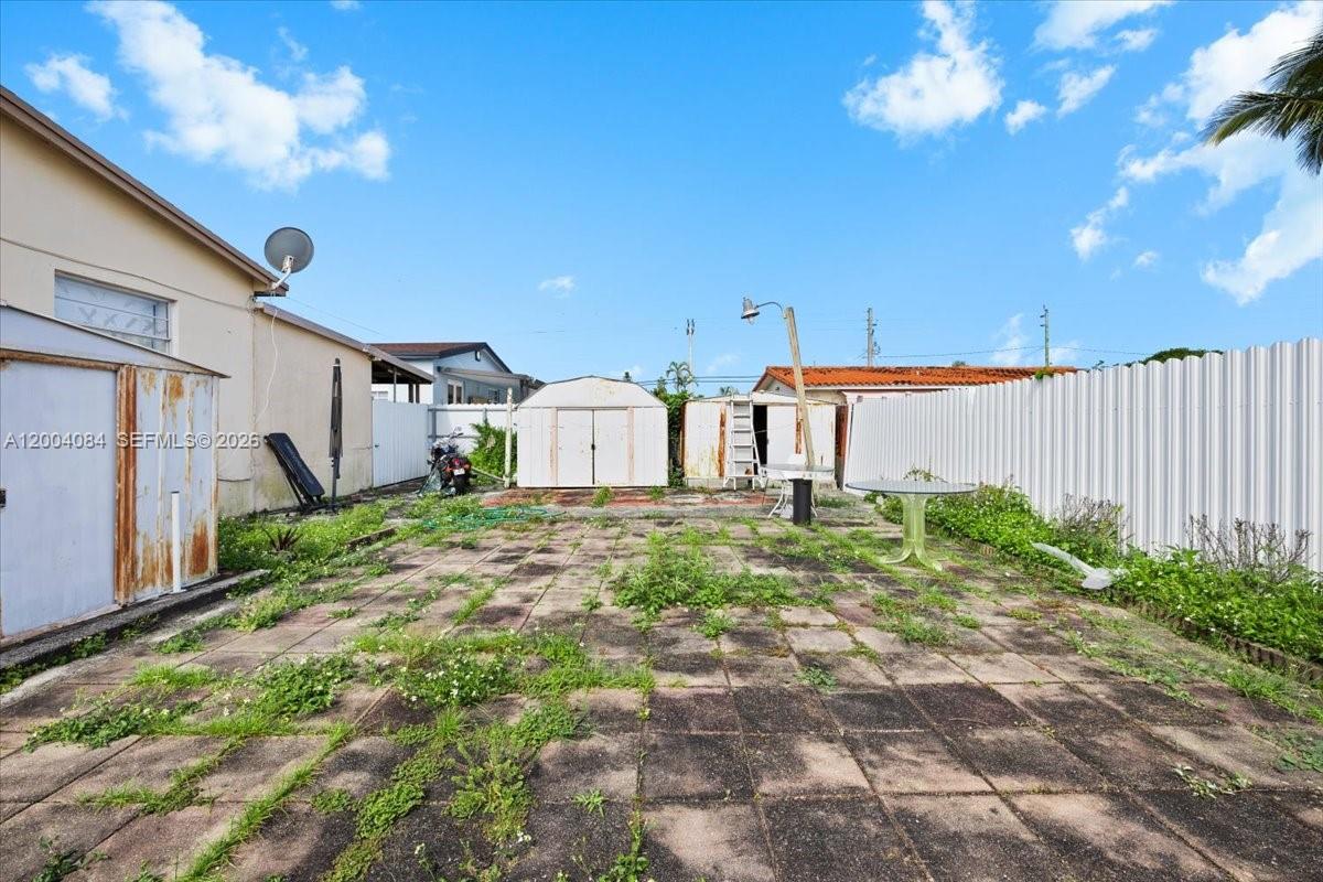 9025 Southwest 36th Street Miami, FL 33165 - Photo 19 of 20 a view of a back yard