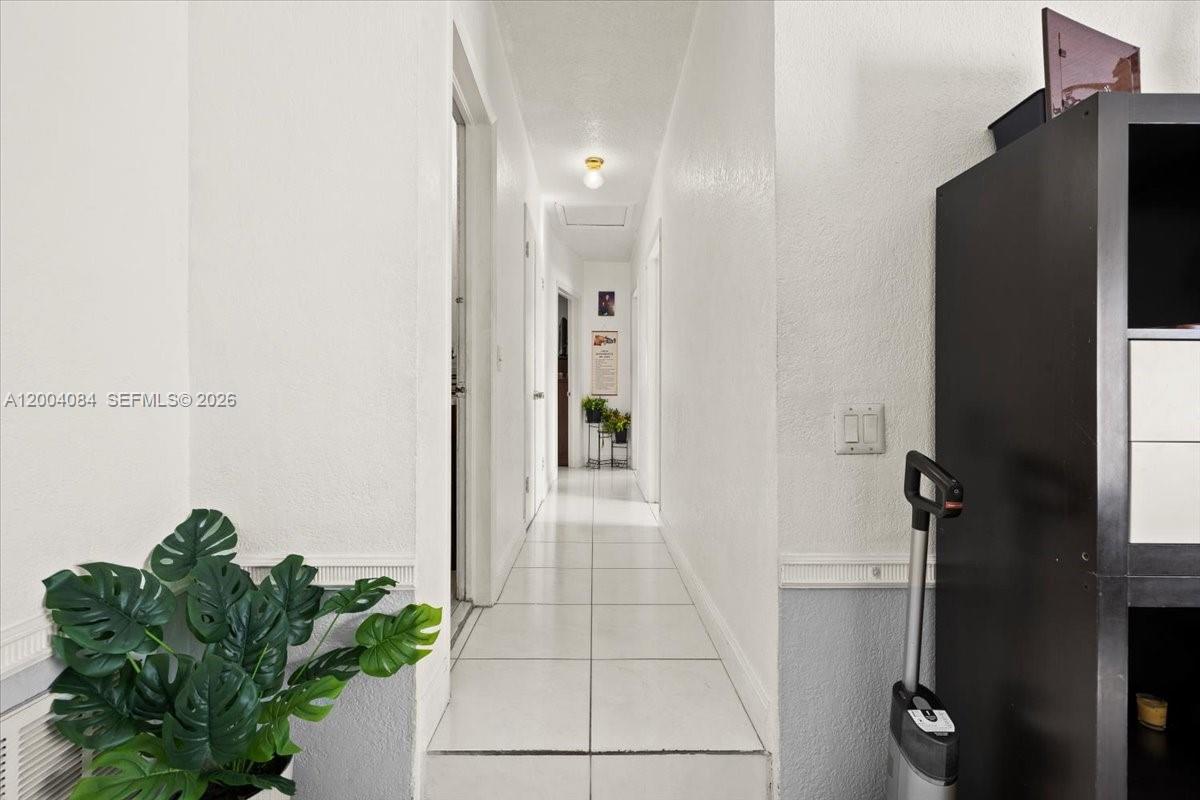 9025 Southwest 36th Street Miami, FL 33165 - Photo 8 of 20 a view of a hallway