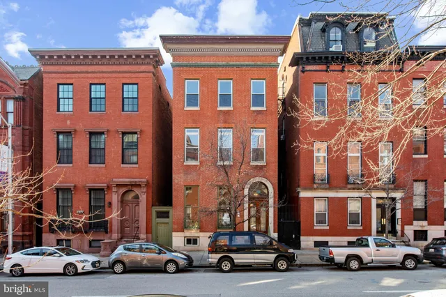 a car parked in front of a building