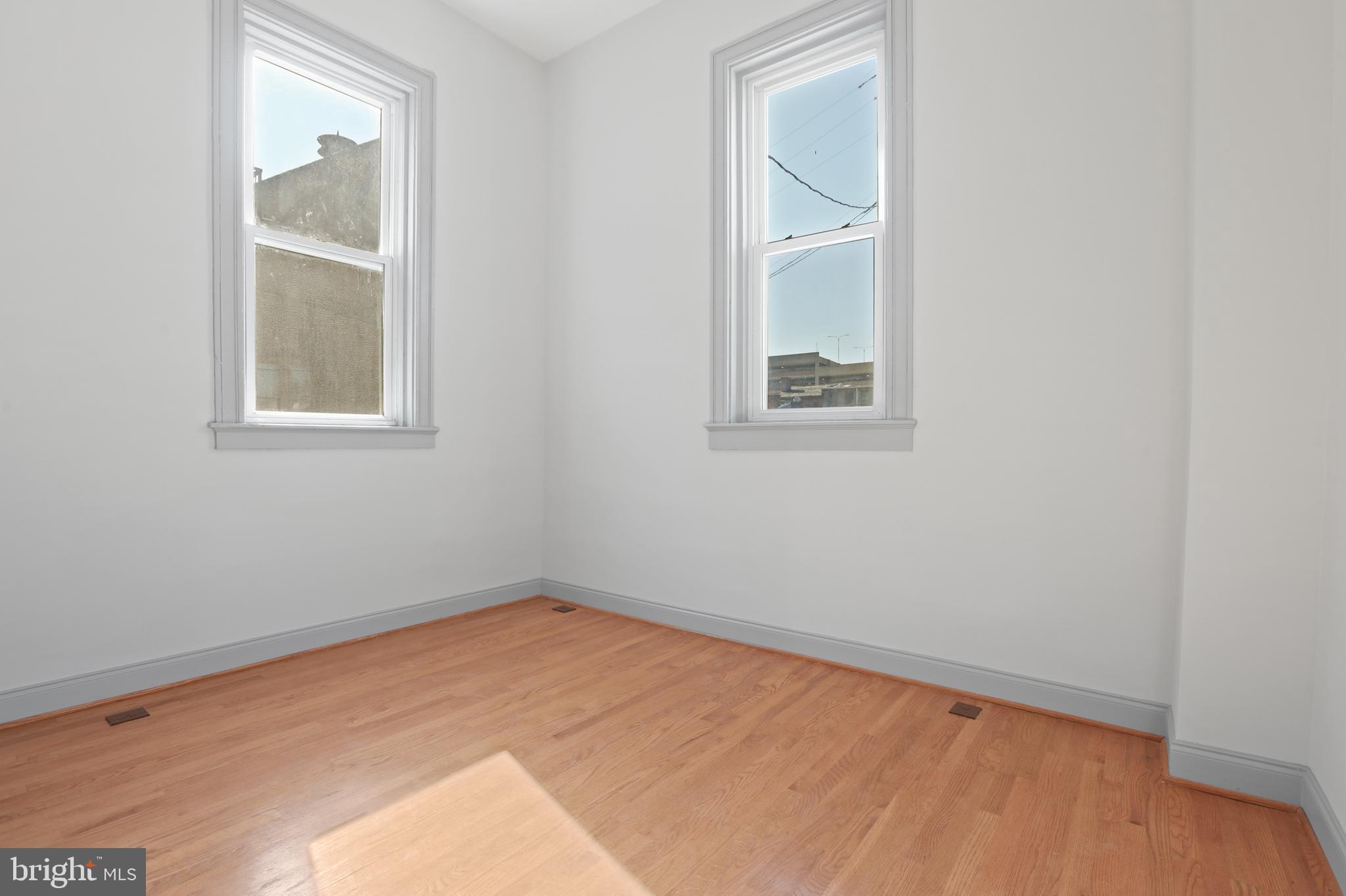 812 Park Avenue, Unit 2FR Baltimore, MD 21201 - Photo 30 of 30 an empty room with a window