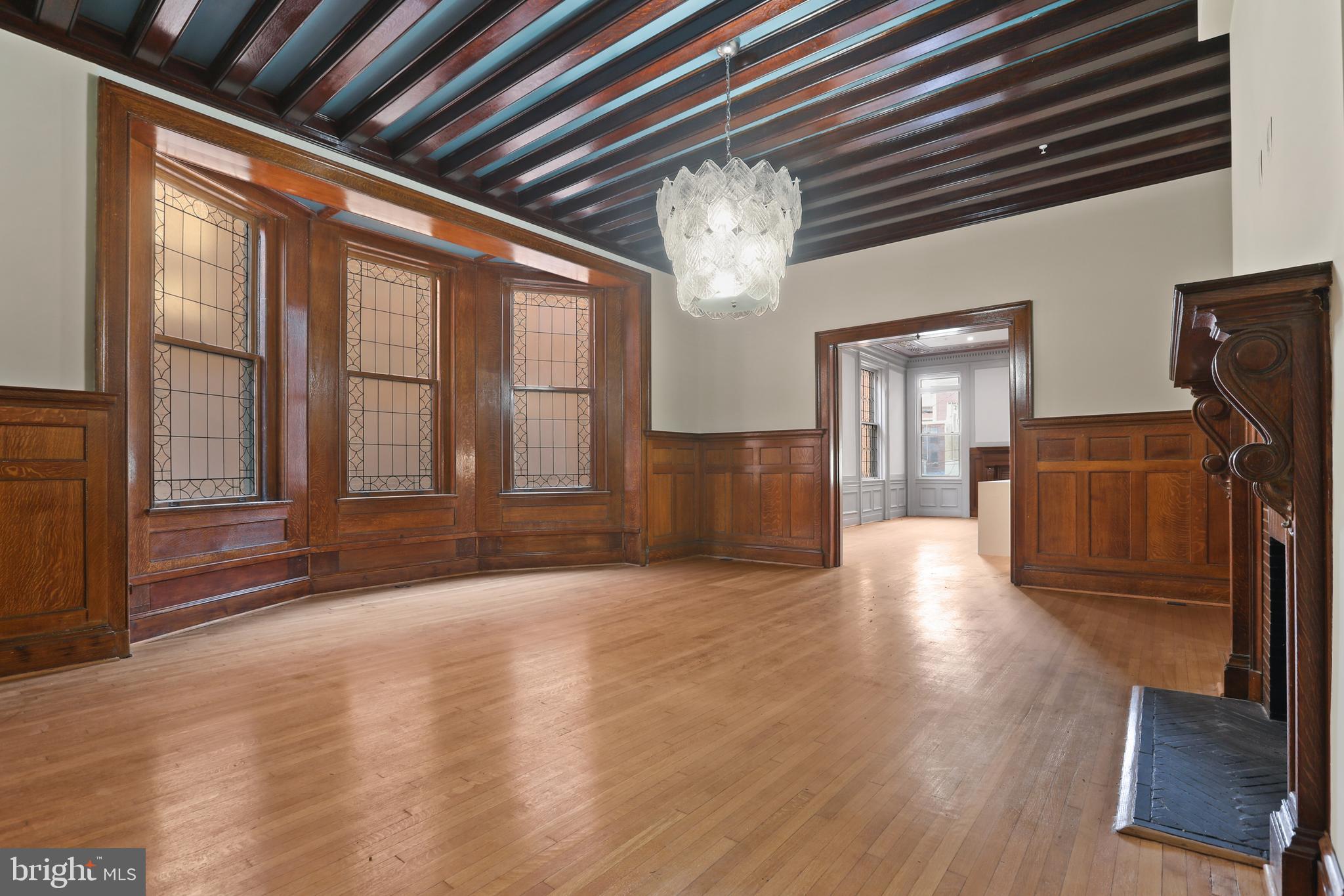 812 Park Avenue, Unit 2FR Baltimore, MD 21201 - Photo 7 of 30 a view of livingroom with hardwood floor and a ceiling fan