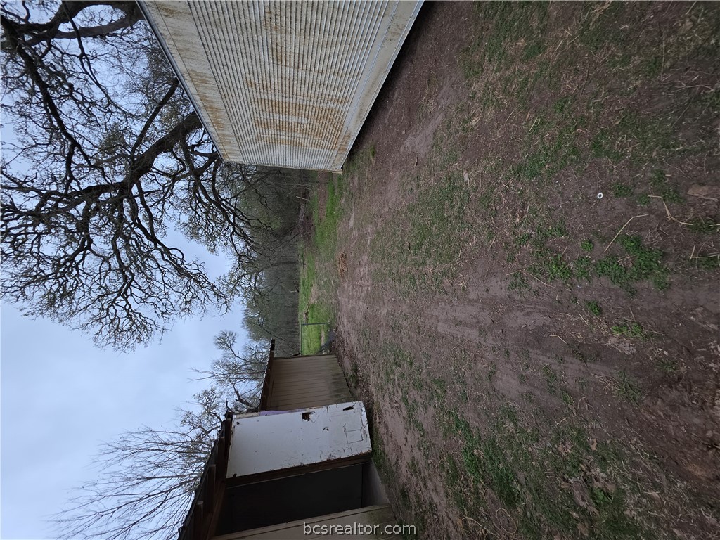 3815 Luza Lane Bryan, TX 77807 - Photo 17 of 18 a view of a backyard of the house