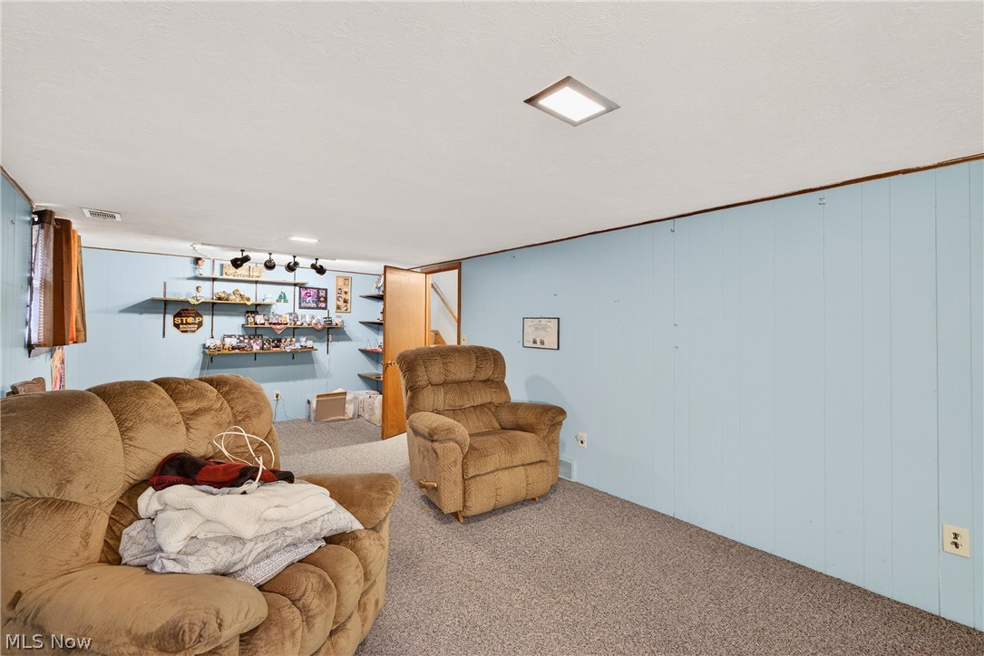 4404 Florida Street Perry, OH 44081 - Photo 20 of 24 Living area featuring carpet flooring