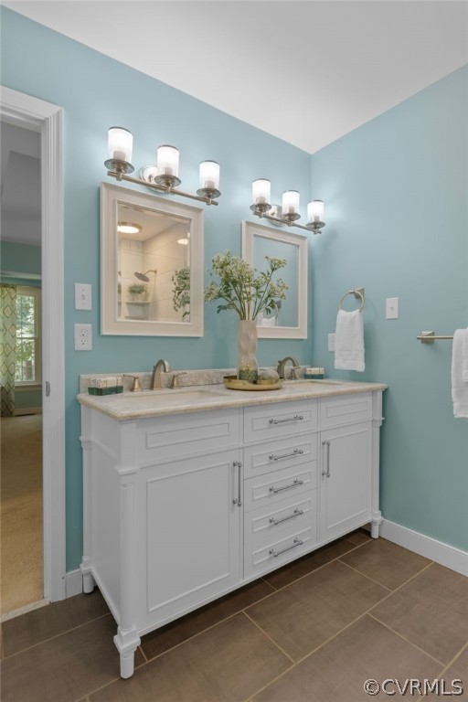 5423 Houndmaster Road Midlothian, VA 23112 - Photo 26 of 49 a bathroom with a sink and a mirror