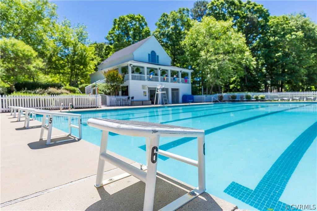 5423 Houndmaster Road Midlothian, VA 23112 - Photo 42 of 49 a view of a house with swimming pool and sitting area