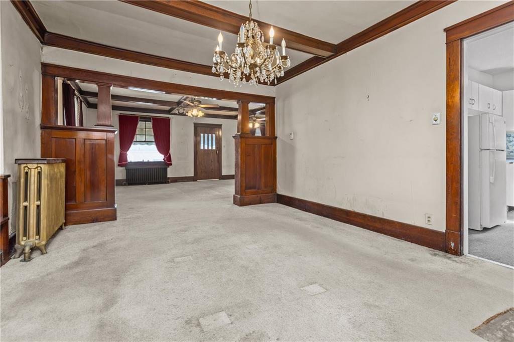 1050 Hiland Avenue Coraopolis, PA 15108 - Photo 13 of 33 a view of a big room with closet and chandelier