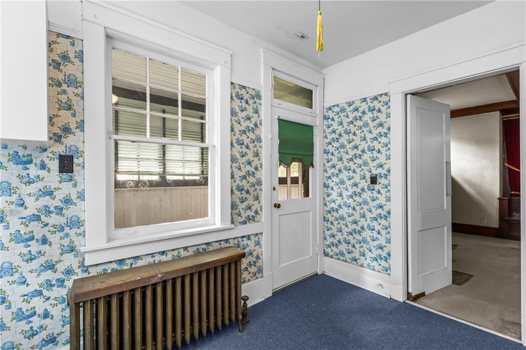 1050 Hiland Avenue Coraopolis, PA 15108 - Photo 17 of 33 hallway with window and front door