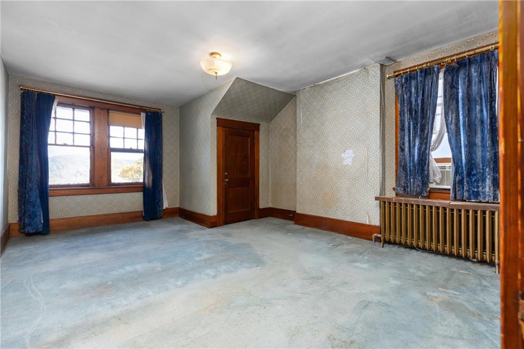 1050 Hiland Avenue Coraopolis, PA 15108 - Photo 19 of 33 an empty room with windows