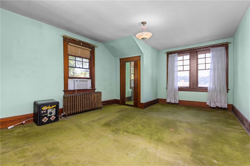 1050 Hiland Avenue Coraopolis, PA 15108 - Photo 21 of 33 an empty room with windows