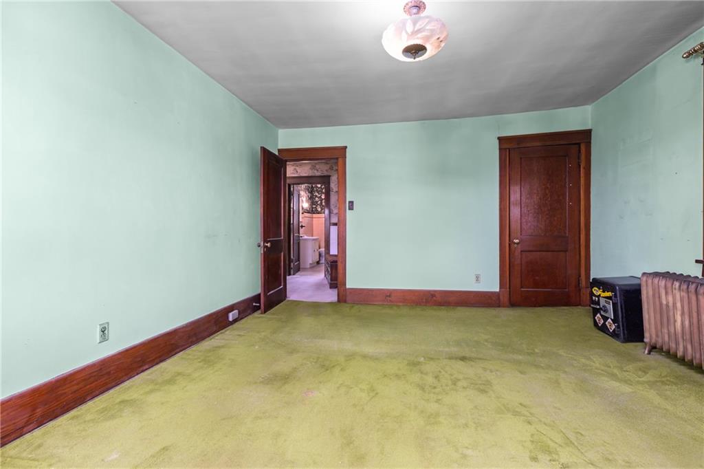 1050 Hiland Avenue Coraopolis, PA 15108 - Photo 22 of 33 a view of an empty room with a window