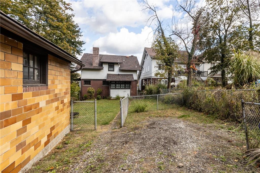 1050 Hiland Avenue Coraopolis, PA 15108 - Photo 30 of 33 a view of house with a backyard