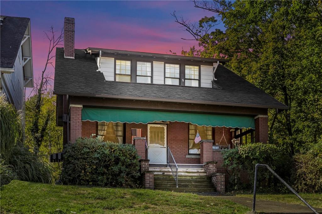 1050 Hiland Avenue Coraopolis, PA 15108 - Photo 33 of 33 a view of house with yard and outdoor seating