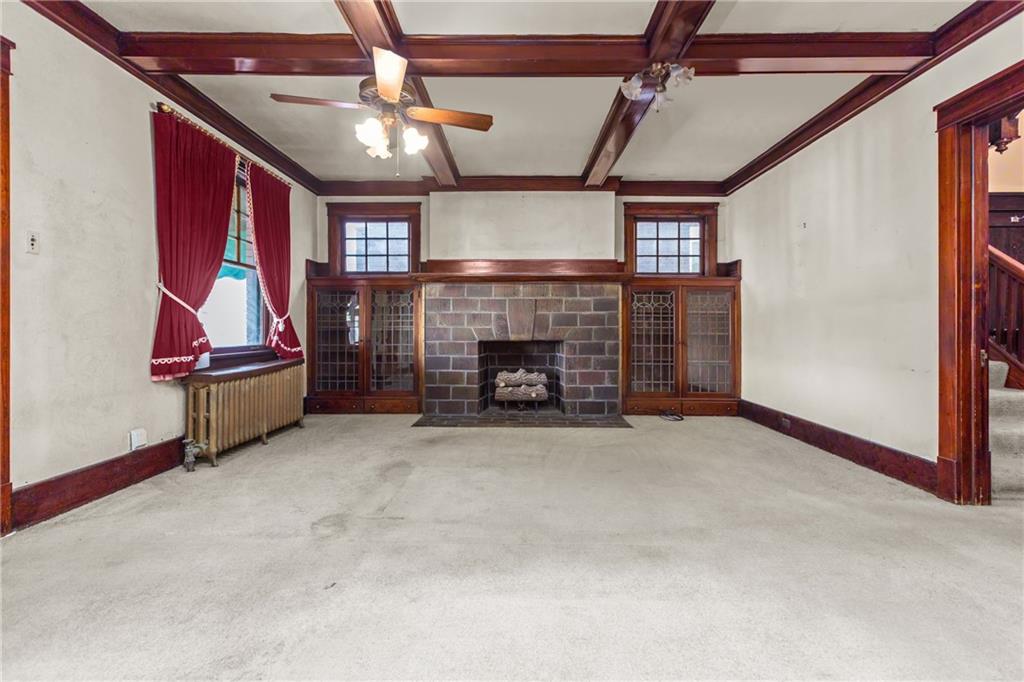 1050 Hiland Avenue Coraopolis, PA 15108 - Photo 7 of 33 a view of an empty room with fire place