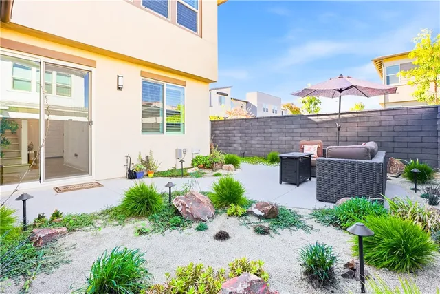 a view of entryway with paintings on the wall