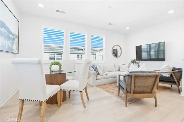 a bedroom with a bed and a table