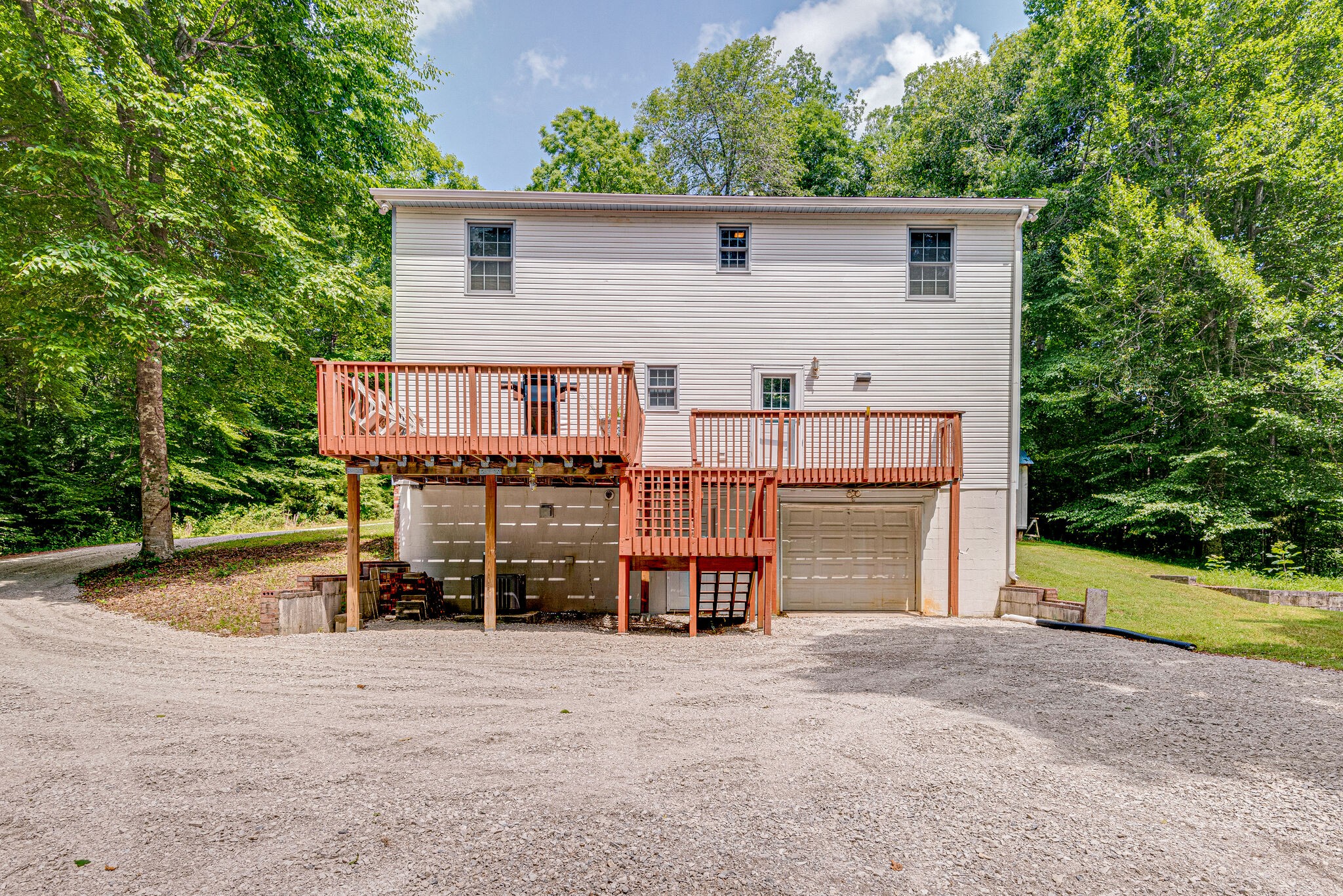 1803 East Piney Road Dickson, TN 37055 - Photo 29 of 46 a front view of a house with a yard