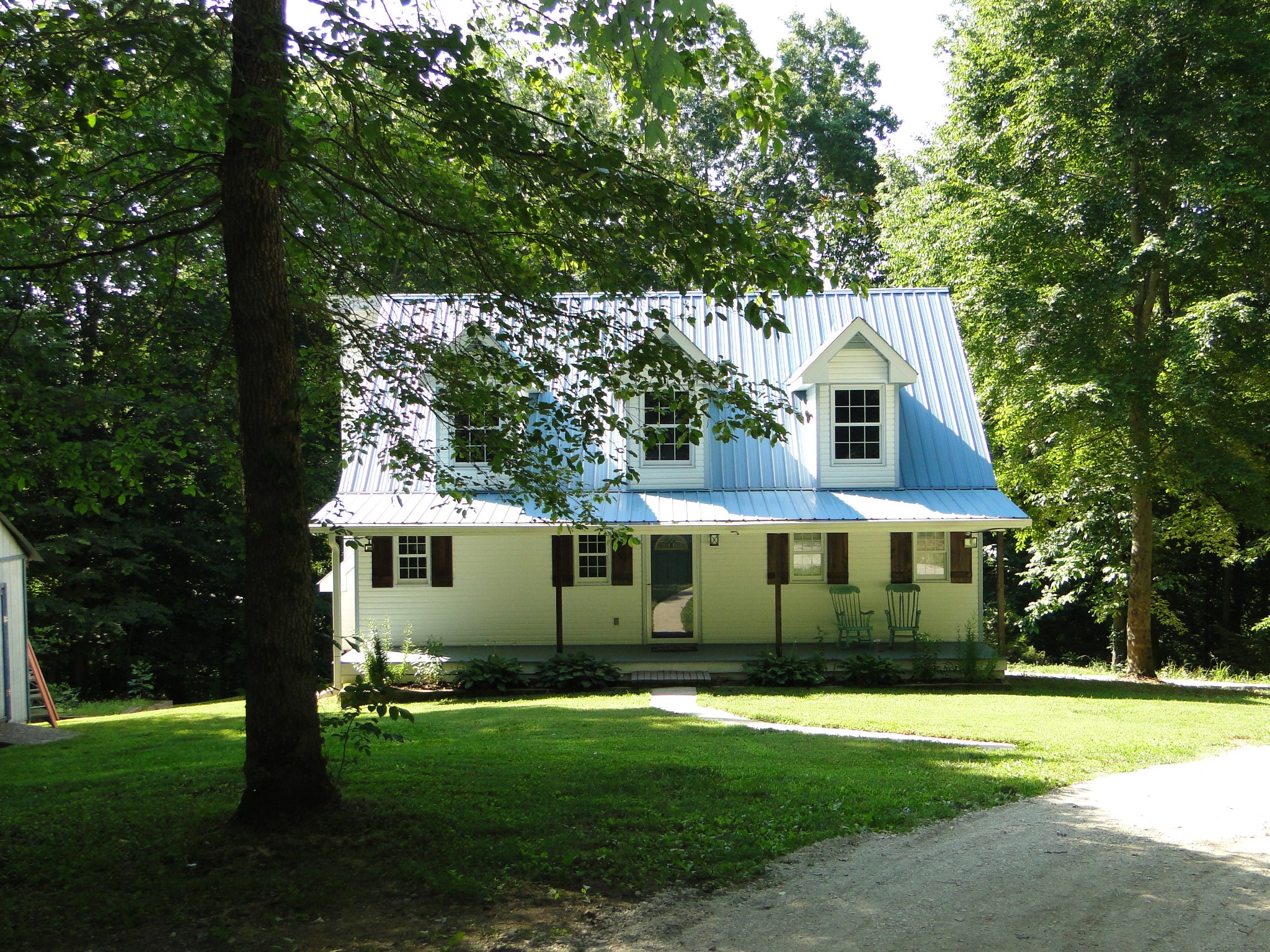 1803 East Piney Road Dickson, TN 37055 - Photo 36 of 46 a front view of a house with a yard
